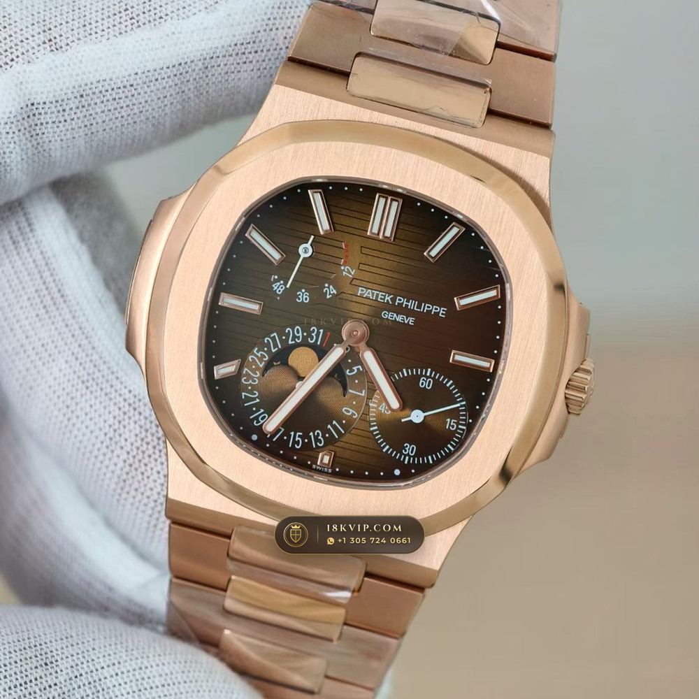Patek Philippe Nautilus Moonphase & Power Reserve 18K Rose Gold Ref. 5712/1R — Private Vault Edition — Studio Gallery Plate IV in 18K Rose Gold Au750 (186.5g Verified Mass, Patek Philippe Cal. 240 PS IRM C LU - 22K Gold Micro-Rotor)