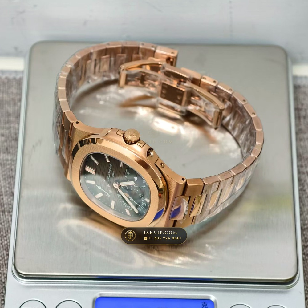 Patek Philippe Nautilus Moonphase & Power Reserve 18K Rose Gold Ref. 5712/1R — Private Vault Edition — Studio Gallery Plate IX in 18K Rose Gold Au750 (186.5g Verified Mass, Patek Philippe Cal. 240 PS IRM C LU - 22K Gold Micro-Rotor)