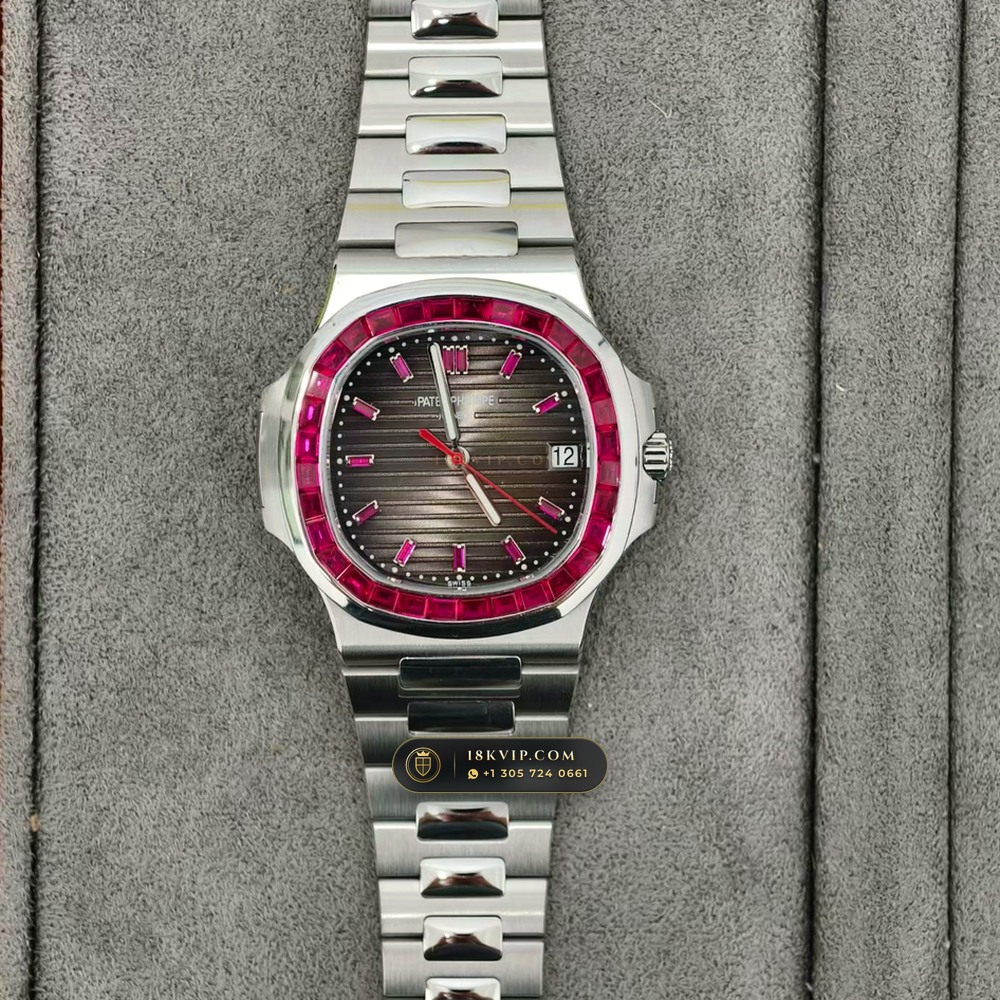 Patek Philippe Nautilus Self-Winding Baguette Ruby Bezel 950 Platinum Ref. 5711/112P-001 — Private Vault Edition — Studio Gallery Plate II in 950 Platinum Pt950 (245.1g Verified Mass, Patek Philippe Cal. 26-330 S C / Cal. 324 S C - 21K Gold Rotor)