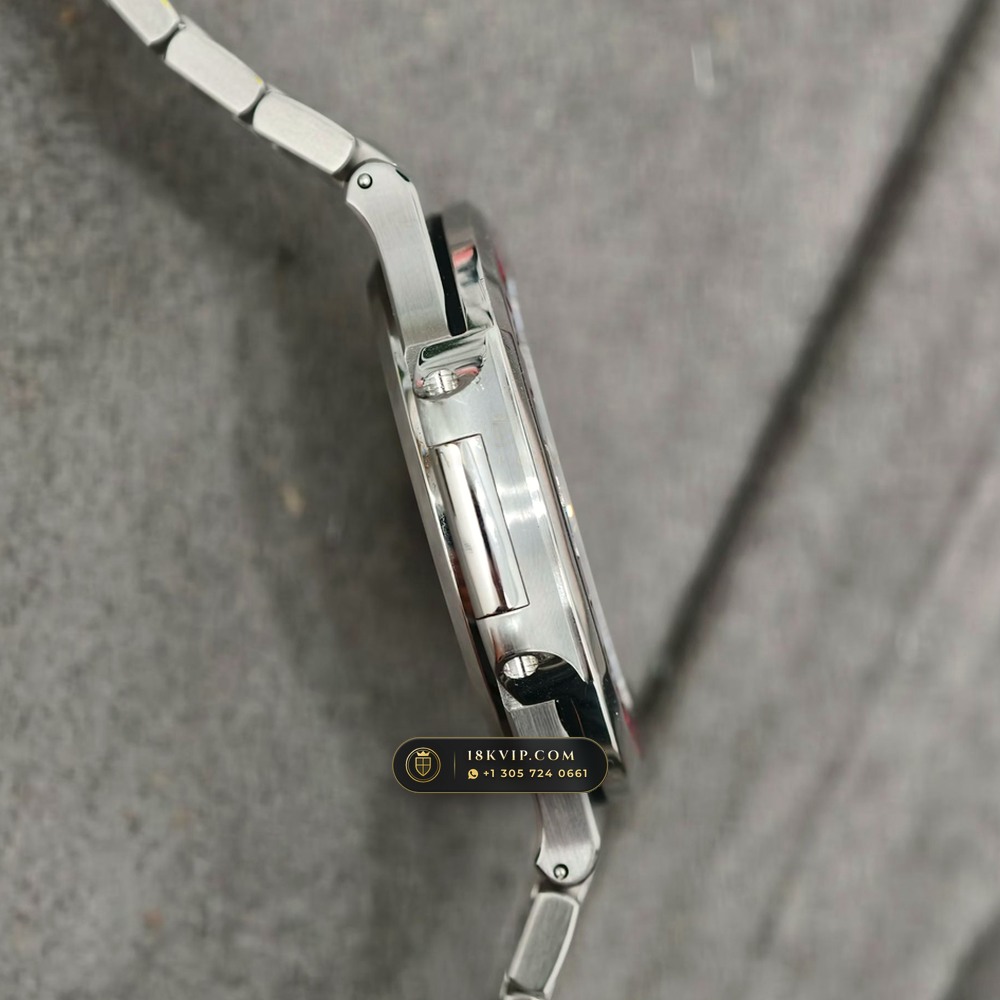 Patek Philippe Nautilus Self-Winding Baguette Ruby Bezel 950 Platinum Ref. 5711/112P-001 — Private Vault Edition — Studio Gallery Plate V in 950 Platinum Pt950 (245.1g Verified Mass, Patek Philippe Cal. 26-330 S C / Cal. 324 S C - 21K Gold Rotor)