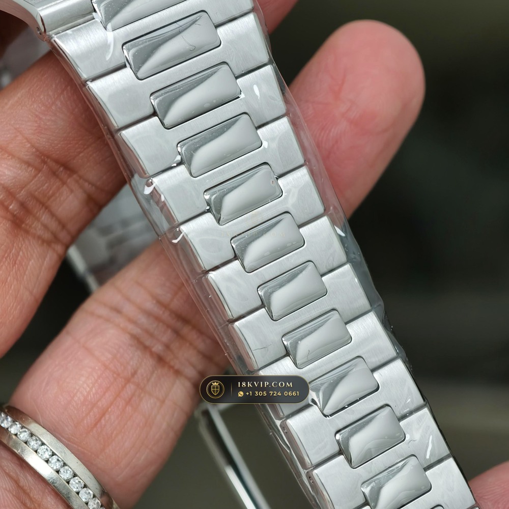 Patek Philippe Nautilus Off-Catalogue Baguette Ruby Bezel 950 Platinum Ref. 5711/112P-001 — Private Vault Edition — Studio Gallery Plate X in 950 Platinum Pt950 (245.4g Verified Mass, Patek Philippe Cal. 26-330 S C / Cal. 324 S C - 21K Gold Rotor)