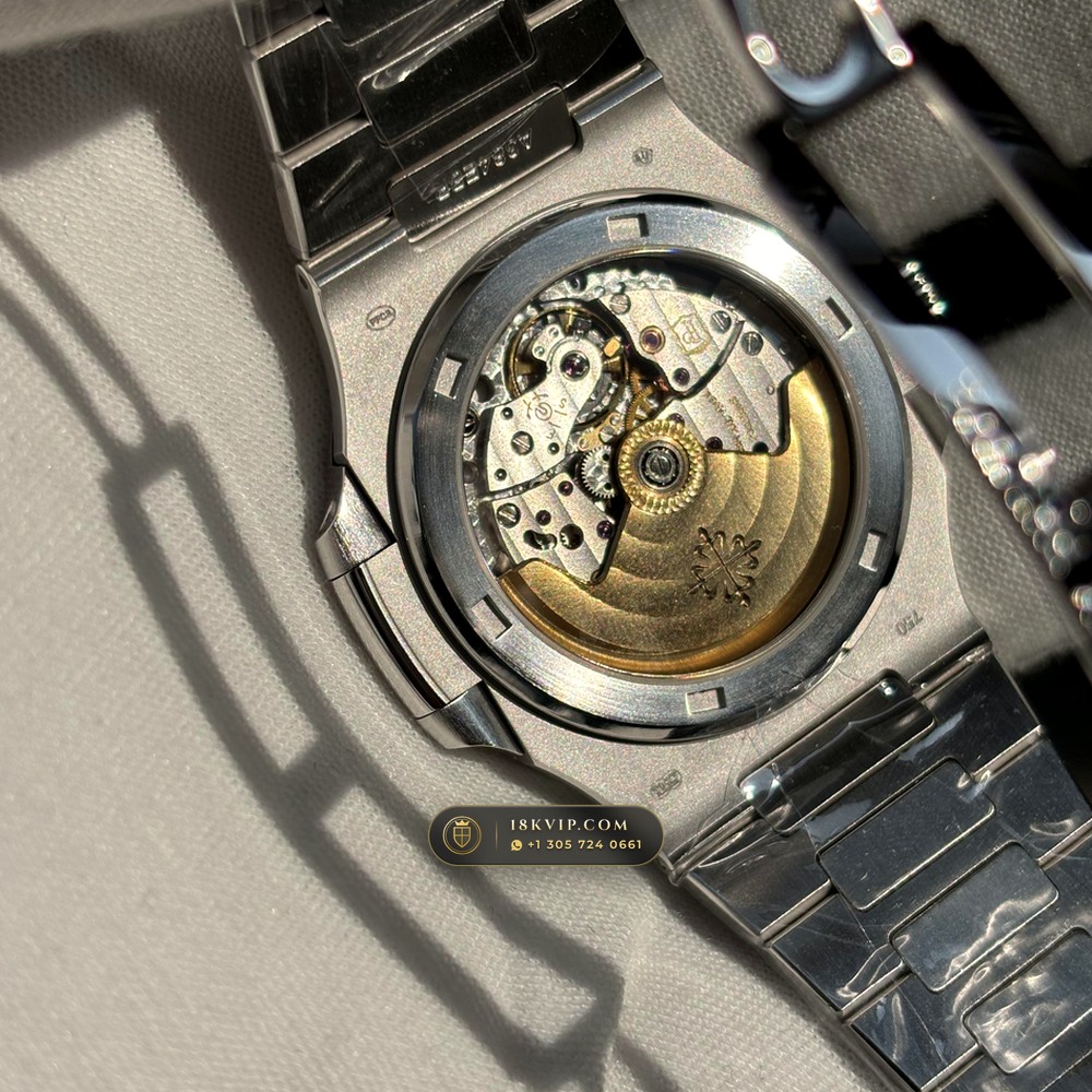 Patek Philippe Nautilus Off-Catalogue Baguette Ruby Bezel Diamond-Set Bezel 950 Platinum Ref. 5711/112P-001 — Private Vault Edition — Studio Gallery Plate VIII in 950 Platinum Pt950 (244.6g Verified Mass, Patek Philippe Cal. 26-330 S C / Cal. 324 S C - 21K Gold Rotor)