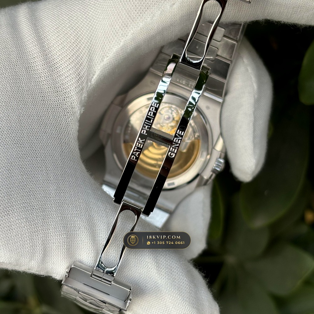 Patek Philippe Nautilus Off-Catalogue Baguette Ruby Bezel Diamond-Set Bezel 950 Platinum Ref. 5711/112P-001 — Private Vault Edition — Studio Gallery Plate IX in 950 Platinum Pt950 (244.6g Verified Mass, Patek Philippe Cal. 26-330 S C / Cal. 324 S C - 21K Gold Rotor)