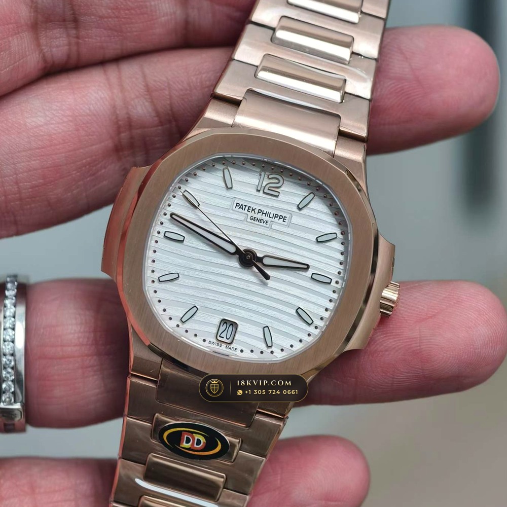 Patek Philippe Nautilus Ladies Automatic 18K Rose Gold Ref. 7118/1R-001 — Private Vault Edition — Studio Gallery Plate III in 18K Rose Gold Au750 (145.8g Verified Mass, Patek Philippe Cal. 324 S C - 21K Gold Rotor)