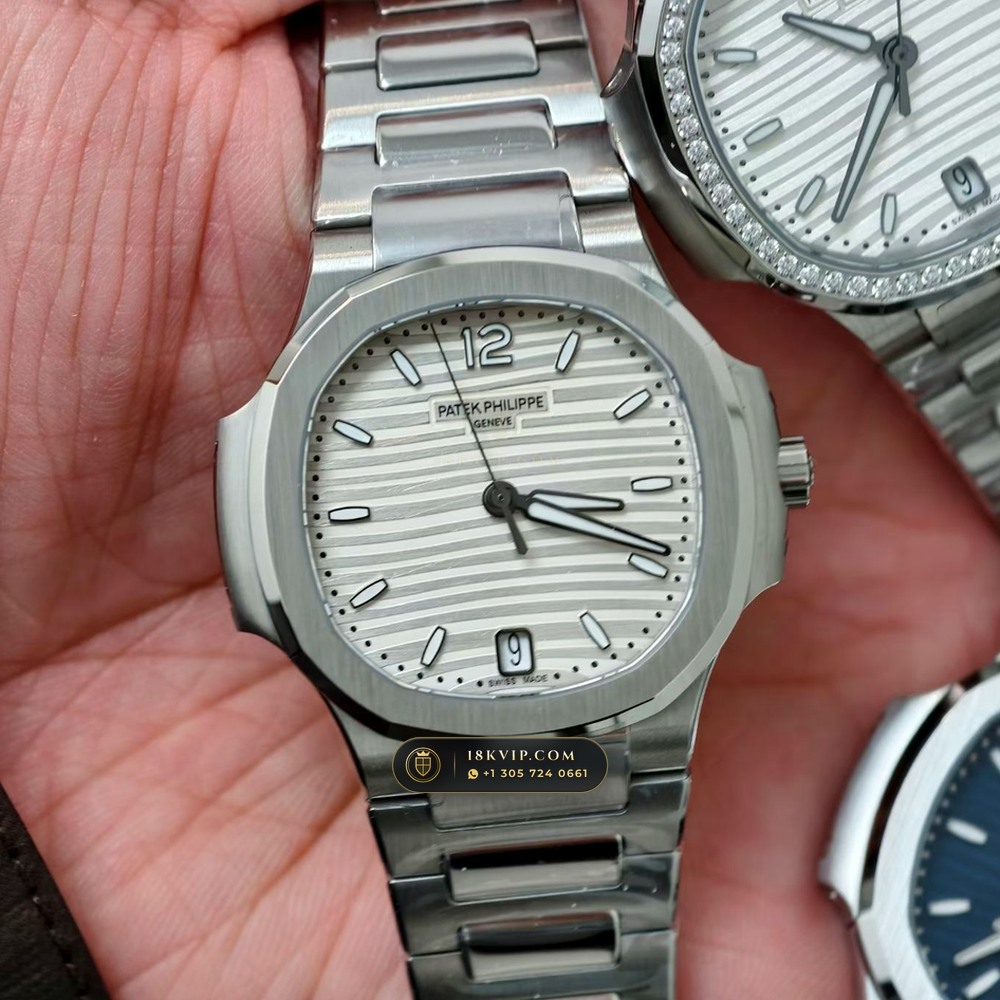 Patek Philippe Nautilus Ladies Automatic 35.2mm Diamond Bezel Ref. 7118/1200A-001 — Private Vault Edition — Studio Gallery Plate II in 904L Stainless Steel Custom Architecture (96.2g Verified Mass, Patek Philippe Cal. 324 S C - 21K Gold Rotor)