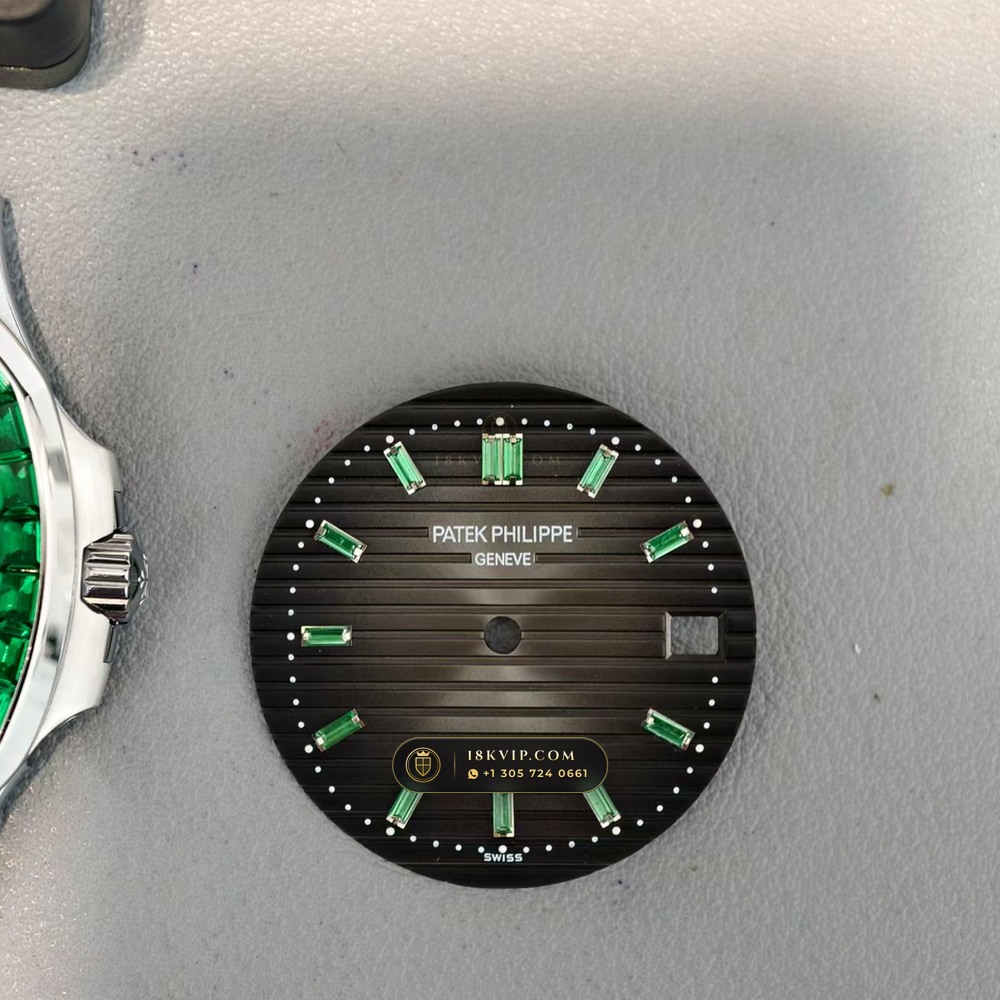 Patek Philippe Nautilus Self-Winding Baguette Emerald Bezel 950 Platinum Geneva Atelier Spec Ref. 5711/113P-001 — Private Vault Edition — Studio Gallery Plate IV in 950 Platinum Pt950 (244.6g Verified Mass, Patek Philippe Cal. 26-330 S C / Cal. 324 S C - 21K Gold Rotor)
