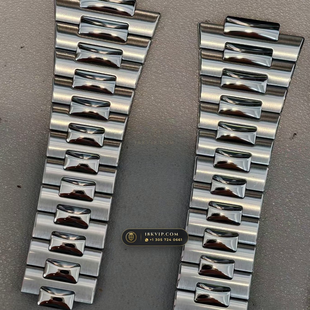 Patek Philippe Nautilus Self-Winding Baguette Emerald Bezel 950 Platinum Geneva Atelier Spec Ref. 5711/113P-001 — Private Vault Edition — Studio Gallery Plate VII in 950 Platinum Pt950 (244.6g Verified Mass, Patek Philippe Cal. 26-330 S C / Cal. 324 S C - 21K Gold Rotor)