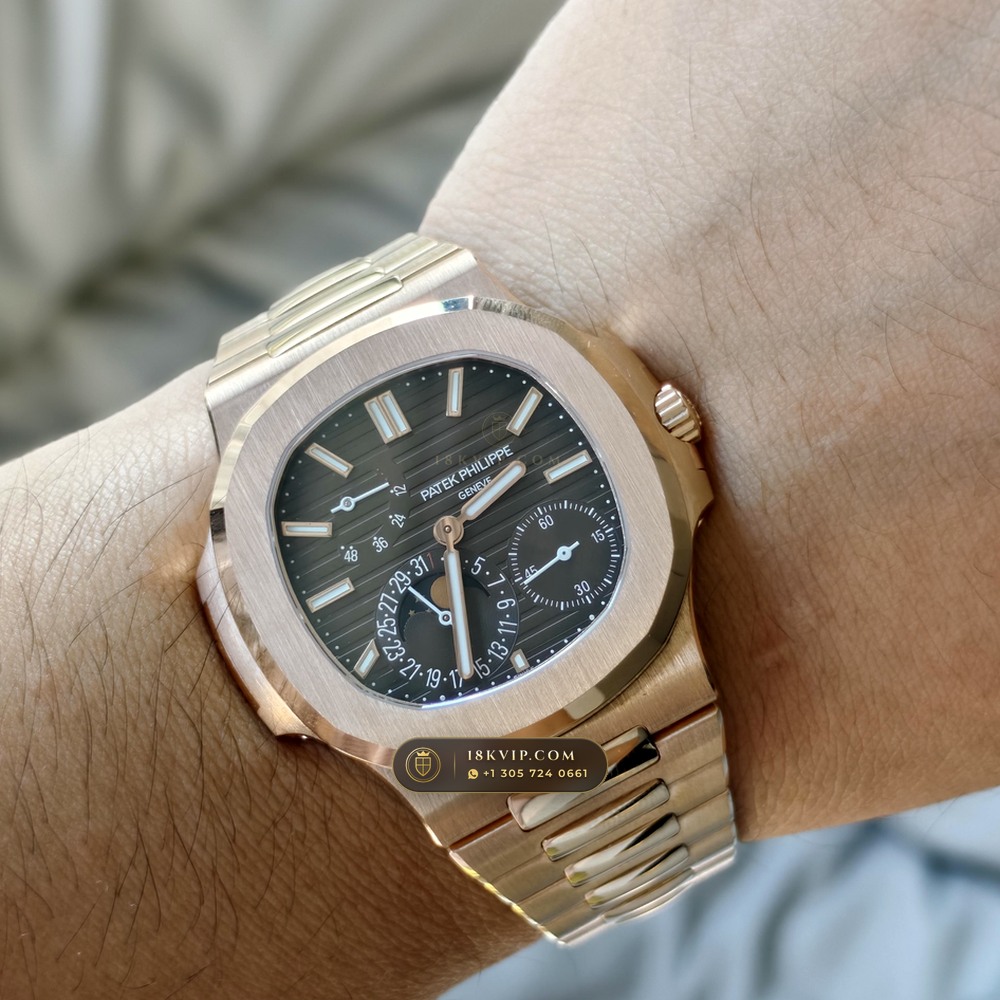 Patek Philippe Nautilus Moonphase & Power Reserve 18K Rose Gold Ref. 5712R/001 — Private Vault Edition — Studio Gallery Plate X in 18K Rose Gold Au750 (105.9g Verified Mass, Patek Philippe Cal. 240 PS IRM C LU - 22K Gold Micro-Rotor)