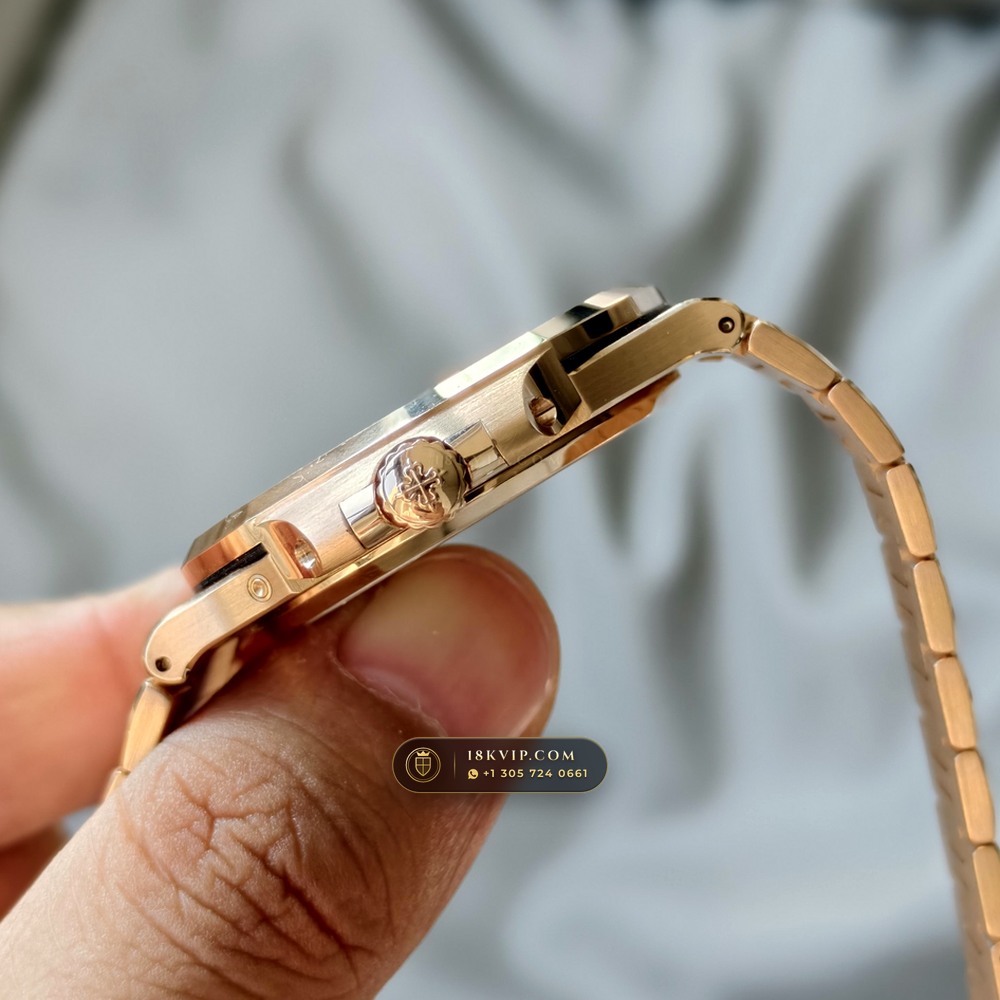 Patek Philippe Nautilus Moonphase & Power Reserve 18K Rose Gold Ref. 5712R/001 — Private Vault Edition — Studio Gallery Plate V in 18K Rose Gold Au750 (105.9g Verified Mass, Patek Philippe Cal. 240 PS IRM C LU - 22K Gold Micro-Rotor)