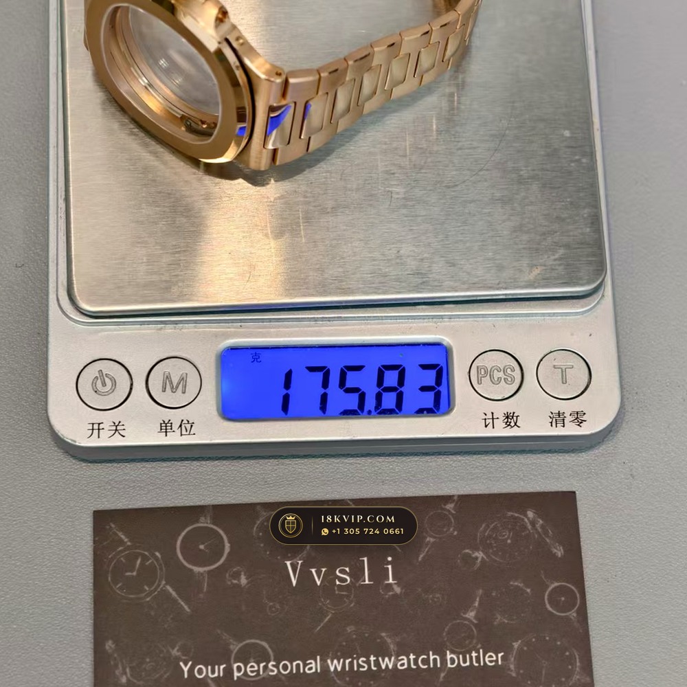 Patek Philippe Nautilus Moonphase & Power Reserve 18K Rose Gold Chronometer Regulated Spec Ref. 5712/1R-001 — Private Vault Edition — Studio Gallery Plate X in 18K Rose Gold Au750 (186.6g Verified Mass, Patek Philippe Cal. 240 PS IRM C LU - 22K Gold Micro-Rotor)