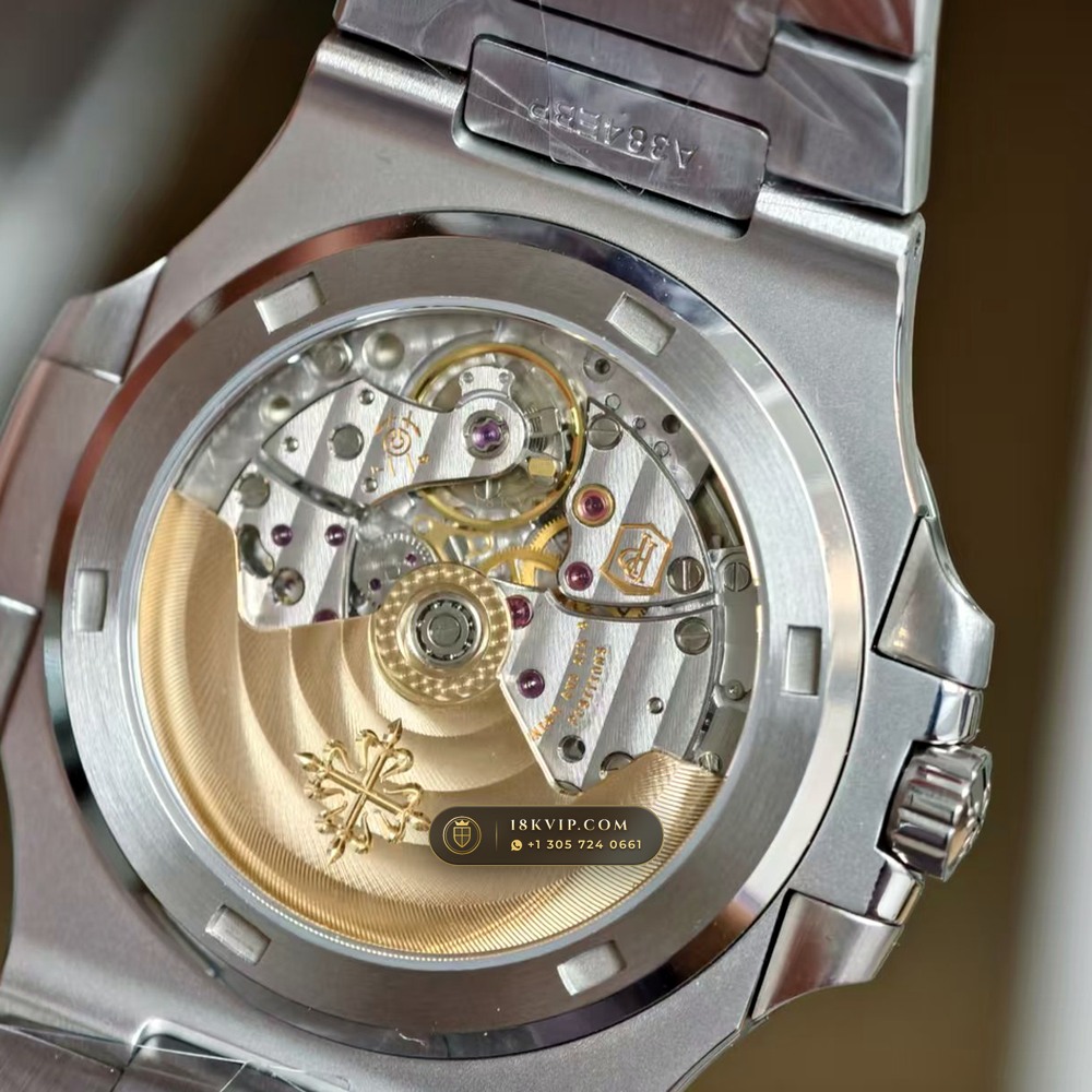 Patek Philippe Nautilus Self-Winding Baguette Emerald Bezel 950 Platinum 22K Gold Rotor Ref. 5711/113P-001 — Private Vault Edition — Studio Gallery Plate XIV in 950 Platinum Pt950 (244.9g Verified Mass, Patek Philippe Cal. 26-330 S C / Cal. 324 S C - 21K Gold Rotor)