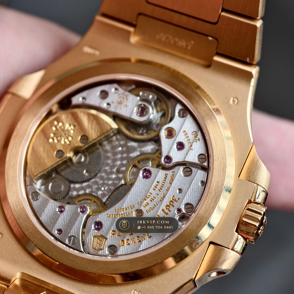 Patek Philippe Nautilus Moonphase & Power Reserve 18K Rose Gold Ref. 5712/1R-001 — Private Vault Edition — Studio Gallery Plate VII in 18K Rose Gold Au750 (186.2g Verified Mass, Patek Philippe Cal. 240 PS IRM C LU - 22K Gold Micro-Rotor)